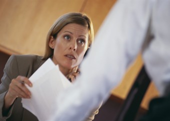 Businesswoman Talking to Colleague